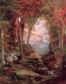 秋の森の木の下の風景 トーマス・モラン